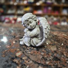 Angel medium ( head turned left)